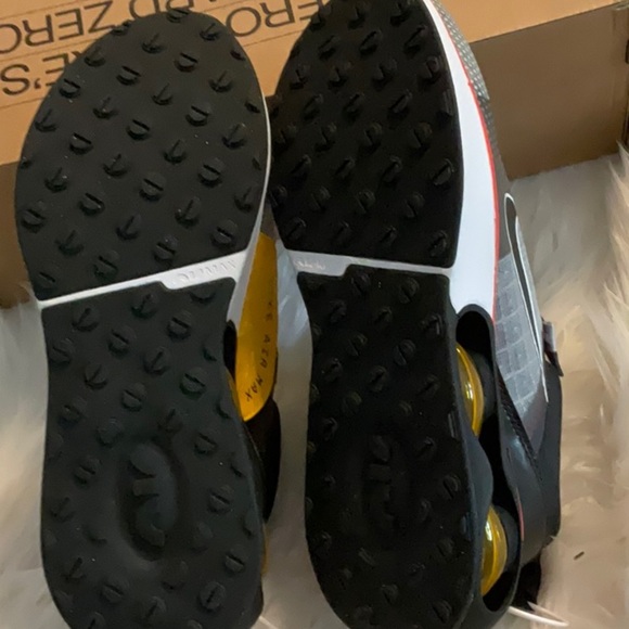 Nike Gray and Black Sneakers with Red and Yellow Accents - Picture 7 of 9